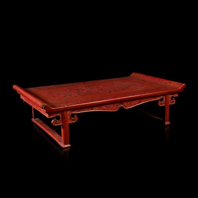 Lot 71 - A Chinese "Tianqi" incised red lacquer stand 大漆龙纹小炕桌