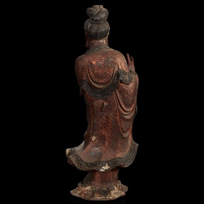 Lot 121 - A Chinese carved and lacquered wood figure of Guanyin