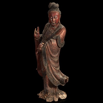 Lot 121 - A Chinese carved and lacquered wood figure of Guanyin