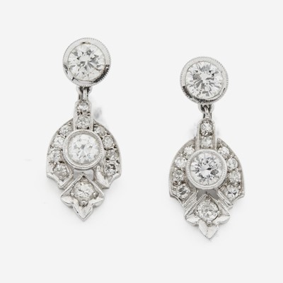 Lot 132 - A pair of diamond and white gold earrings