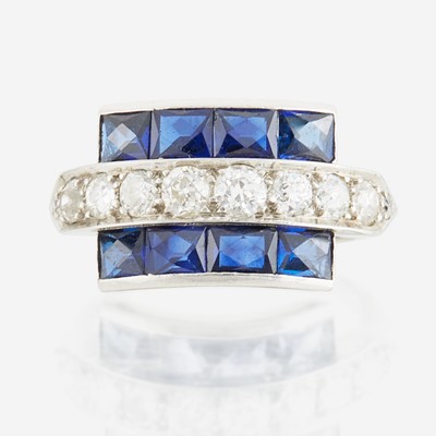 Lot 22 - A diamond, blue glass, and platinum ring