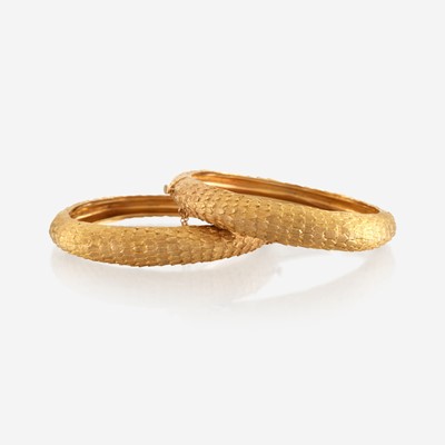 Lot 67 - A pair of gold bracelets