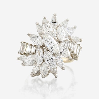 Lot 145 - A diamond, platinum, and white metal ring