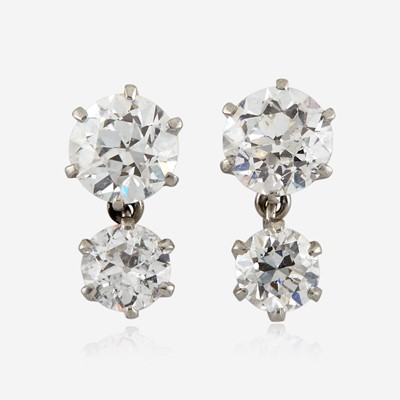 Lot 143 - A pair of diamond and platinum earrings