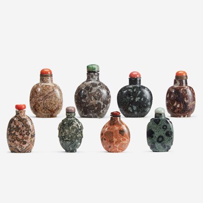 Lot 183 - A group of eight Chinese assorted conglomerate and patterned stone snuff bottles