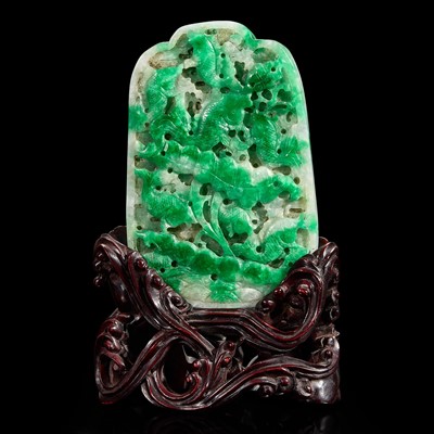Lot 155 - A Chinese carved jadeite panel and wood stand