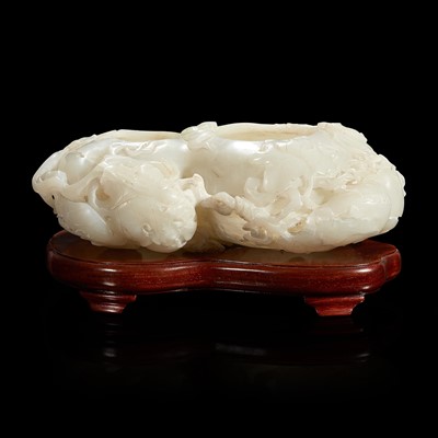 Lot 162 - A Chinese carved white jade double-gourd washer with wood stand