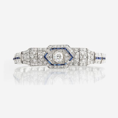 Lot 24 - An Art Deco diamond, sapphire, and platinum bracelet