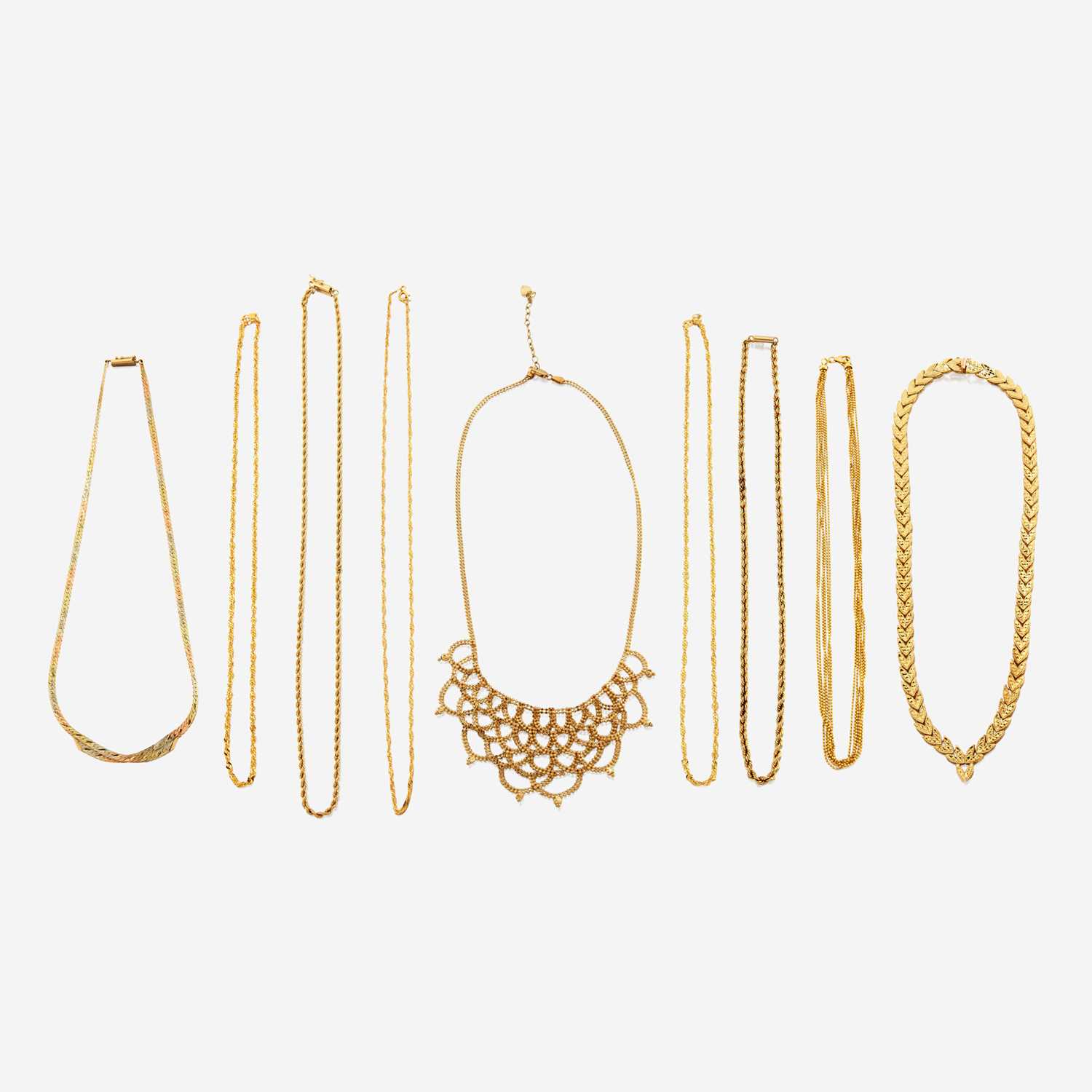 Lot 75 - A collection of nine gold necklaces