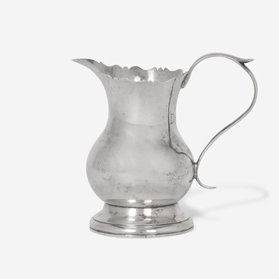 Lot 48 - A silver cream pot