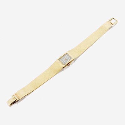 Lot 145 - A lady's gold and diamond bracelet wristwatch, Omega