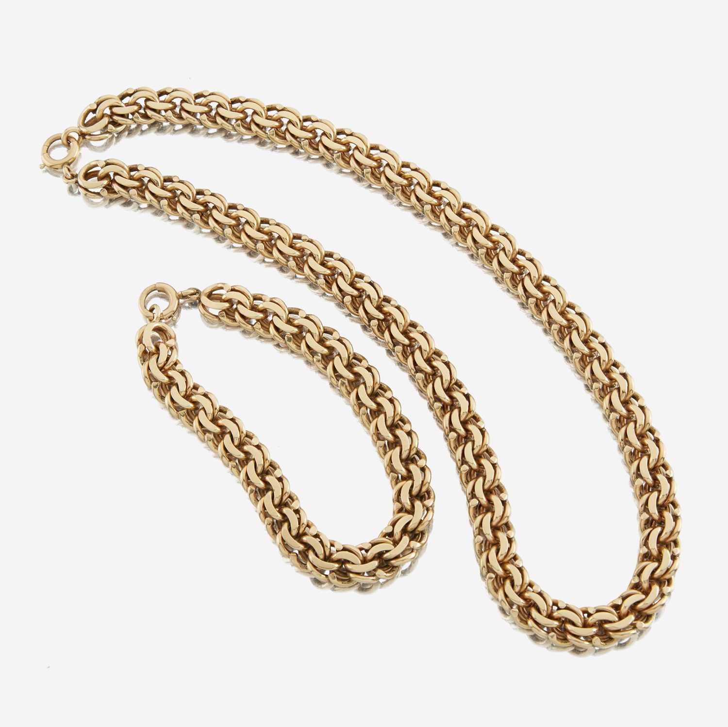 Lot 79 - A gold necklace with matching bracelet, Cartier