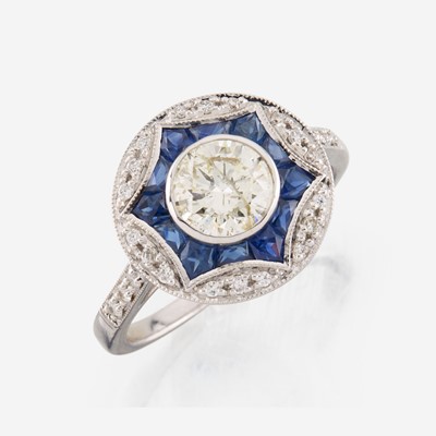 Lot 20 - A diamond, sapphire, and white gold ring