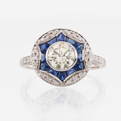 Lot 20 - A diamond, sapphire, and white gold ring