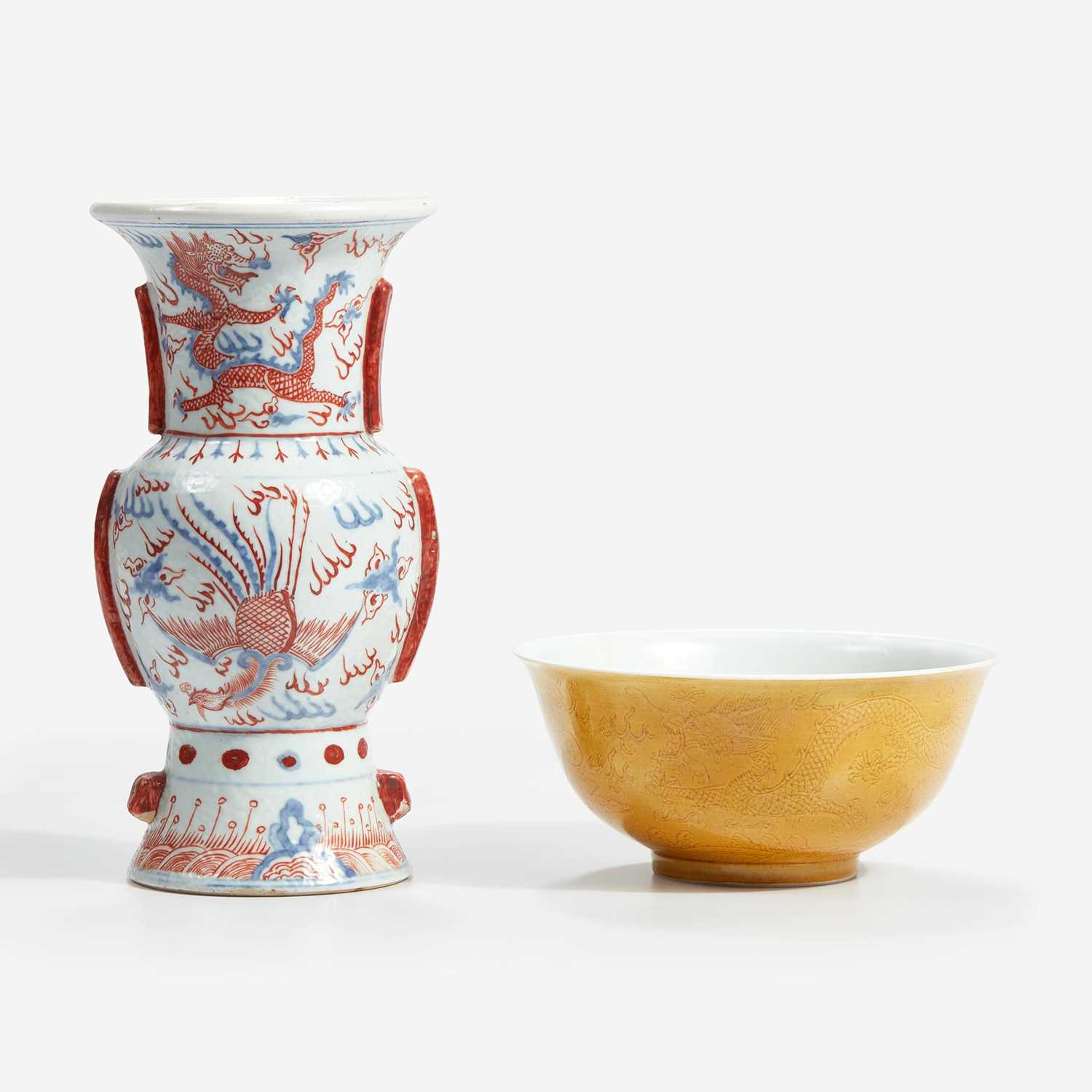 Lot 81 - A Chinese yellow-ground “Dragon” bowl and an iron-red and underglaze blue “Dragon and Phoenix” vase