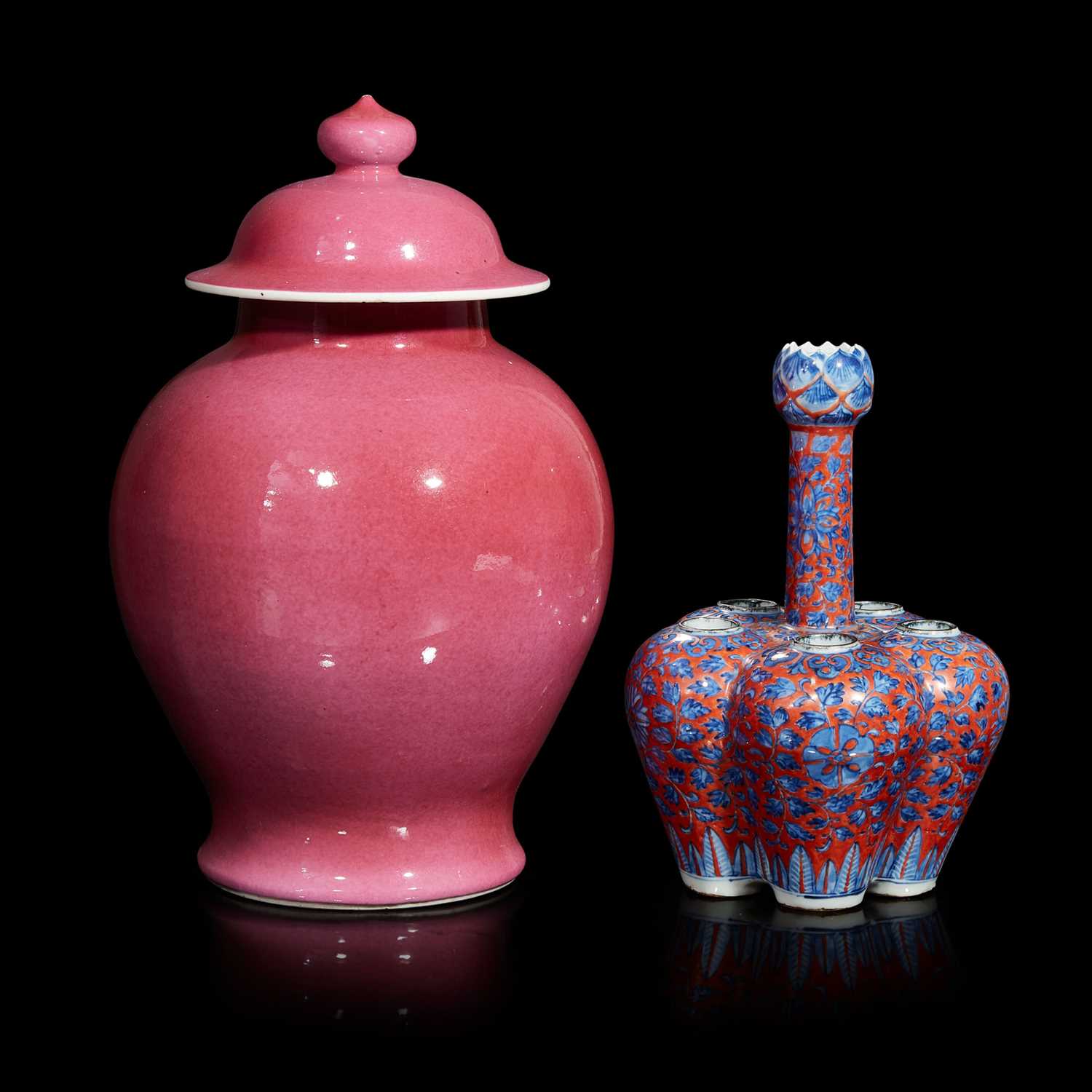 Lot 70 - A Chinese ruby-ground jar and cover and an iron red and underglaze blue "tulip" vase