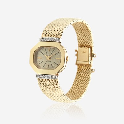 Lot 146 - A diamond bracelet gold watch, Genevé