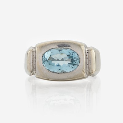 Lot 36 - A fourteen karat white gold contemporary aquamarine ring