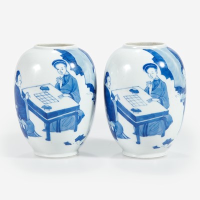 Lot 56 - A pair of Chinese blue and white-decorated porcelain small ovoid vases