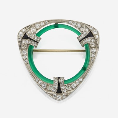 Lot 11 - An Art Deco diamond, onyx, green glass, and platinum brooch