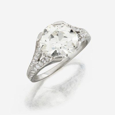 Lot 83 - A platinum and diamond solitaire ring, Tiffany & Co.