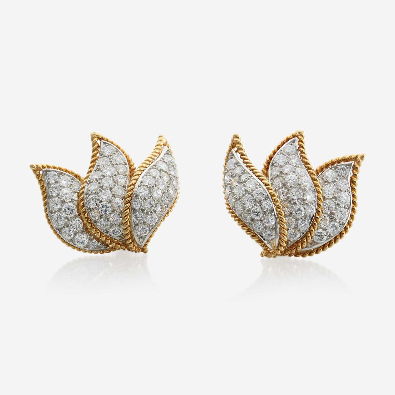 Lot 13 - A pair of gold, platinum, and diamond ear clips, Tiffany & Co.