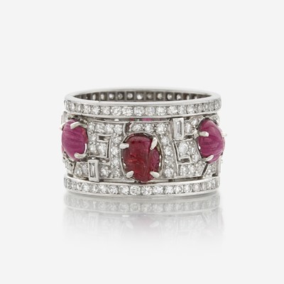 Lot 41 - An Art Deco diamond, ruby, and platinum wide band