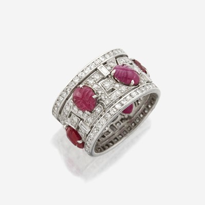Lot 41 - An Art Deco diamond, ruby, and platinum wide band