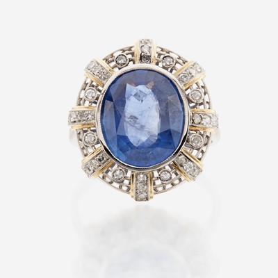 Lot 46 - A sapphire, diamond, gold, and platinum ring