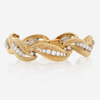 Lot 23 - A gold, platinum, and diamond bracelet, David Webb