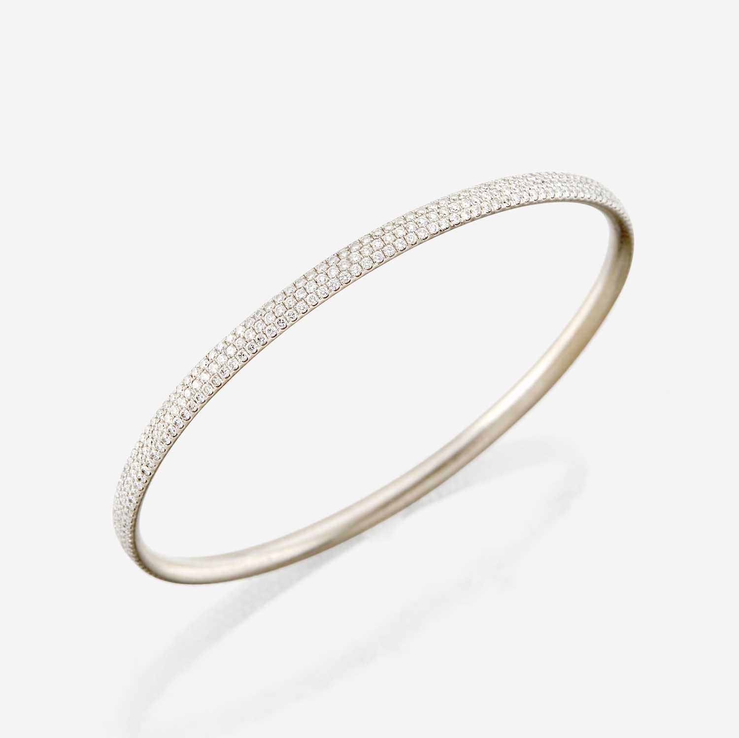 Lot 31 - A diamond and white gold bangle bracelet, Tiffany & Co.