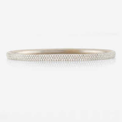 Lot 31 - A diamond and white gold bangle bracelet, Tiffany & Co.