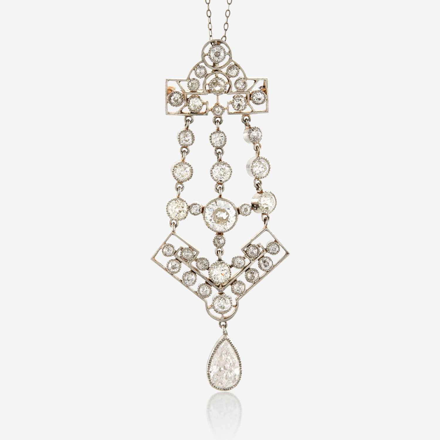 Lot 7 - A diamond and platinum topped gold pendant