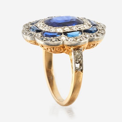Lot 24 - A sapphire, diamond, and platinum topped gold ring