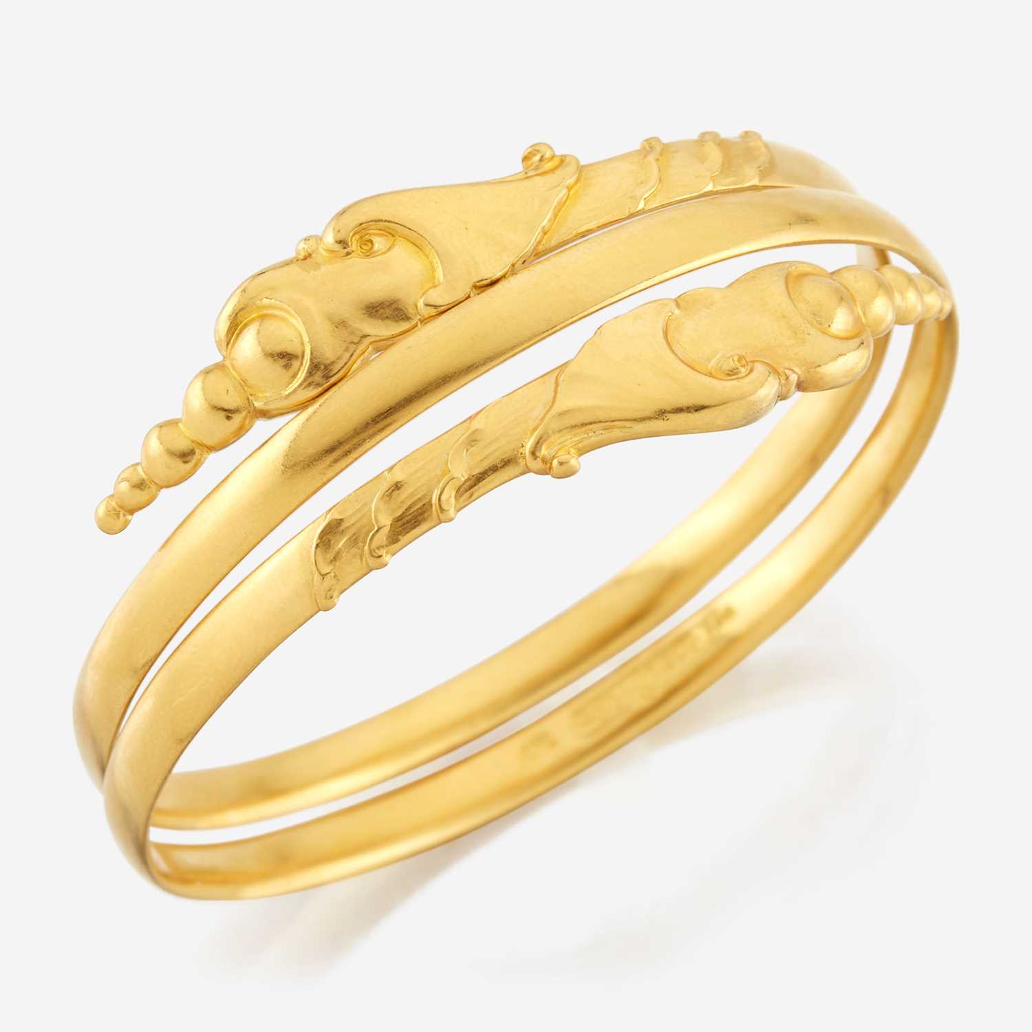 Lot 14 - An Arts and Crafts gold bangle, Evald Nielsen