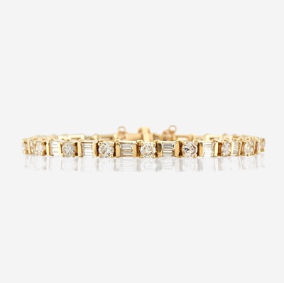 Lot 127 - A diamond and gold bracelet