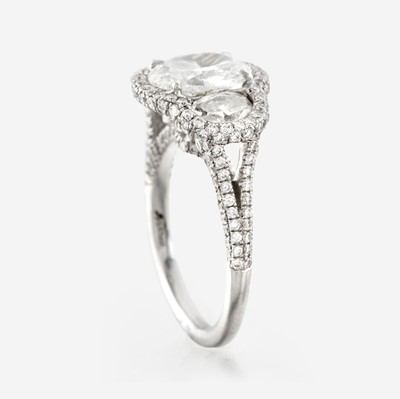 Lot 85 - A diamond and platinum ring, JB Star