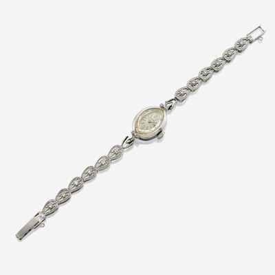 Lot 131 - A lady's white gold diamond bracelet watch, Hamilton