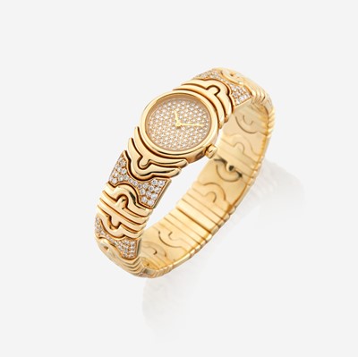Lot 153 - A gold and diamond bracelet watch, Bvgari