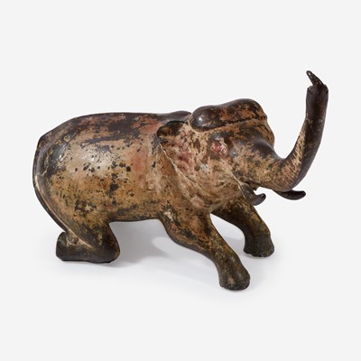 Lot 135 - An Indian Polychromed Metal Kneeling Elephant