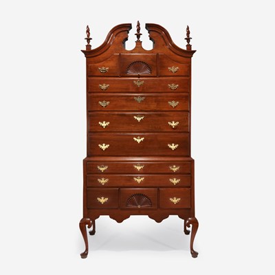 Lot 21 - A Queen Anne carved cherry bonnet-top high chest