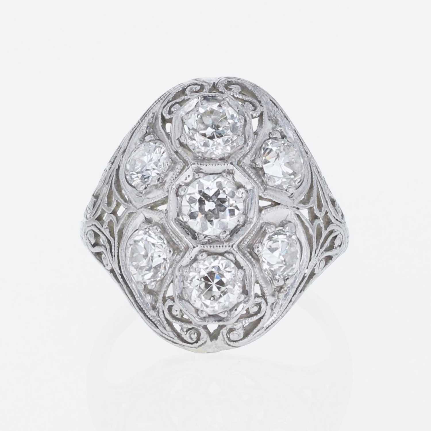 Lot 203 - An Art Deco Platinum and Diamond Ring
