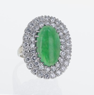 Lot 347 - A 14K White Gold Jadeite and Diamond Ring