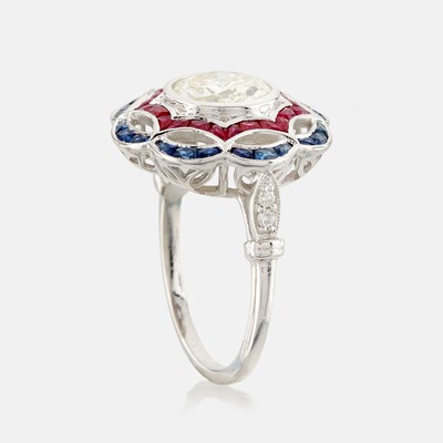 Lot 43 - A diamond, ruby, sapphire, and white gold ring