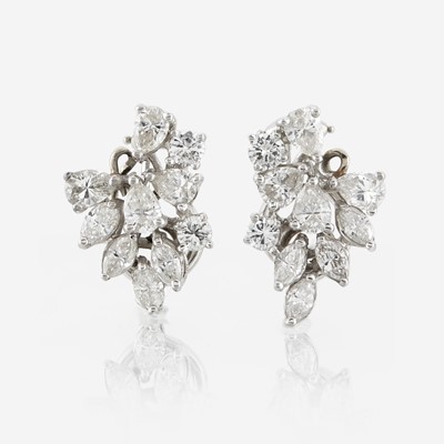 Lot 152 - A pair of diamond and platinum earrings
