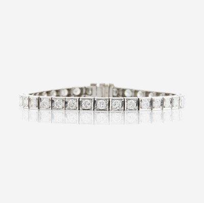 Lot 30 - A diamond and platinum line bracelet