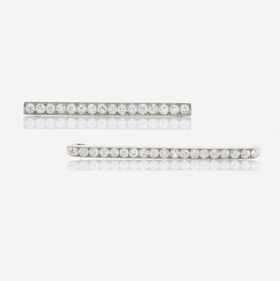 Lot 18 - Two diamond and platinum brooches