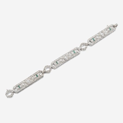 Lot 29 - An Art Deco diamond, emerald, and platinum bracelet