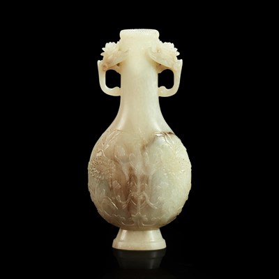 Lot 128 - A Chinese carved white jade Mughal style small bottle vase