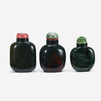 Lot 171 - Three Chinese green hardstone snuff bottles